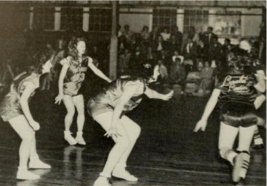 Piedmont women on defense in 1949 yearbook.